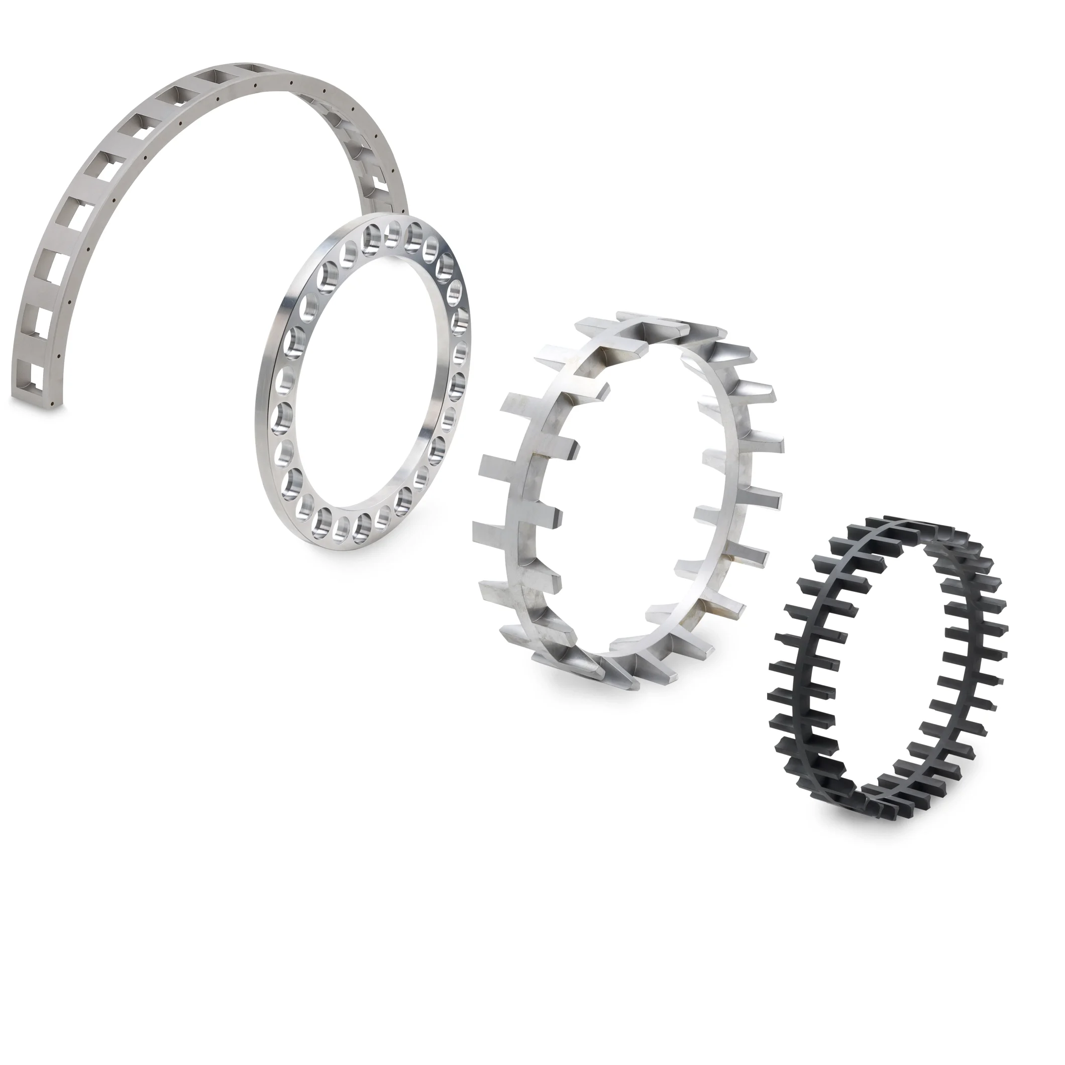 A series of different rolling bearing cage types made of steel and aluminum arranged one behind the other.